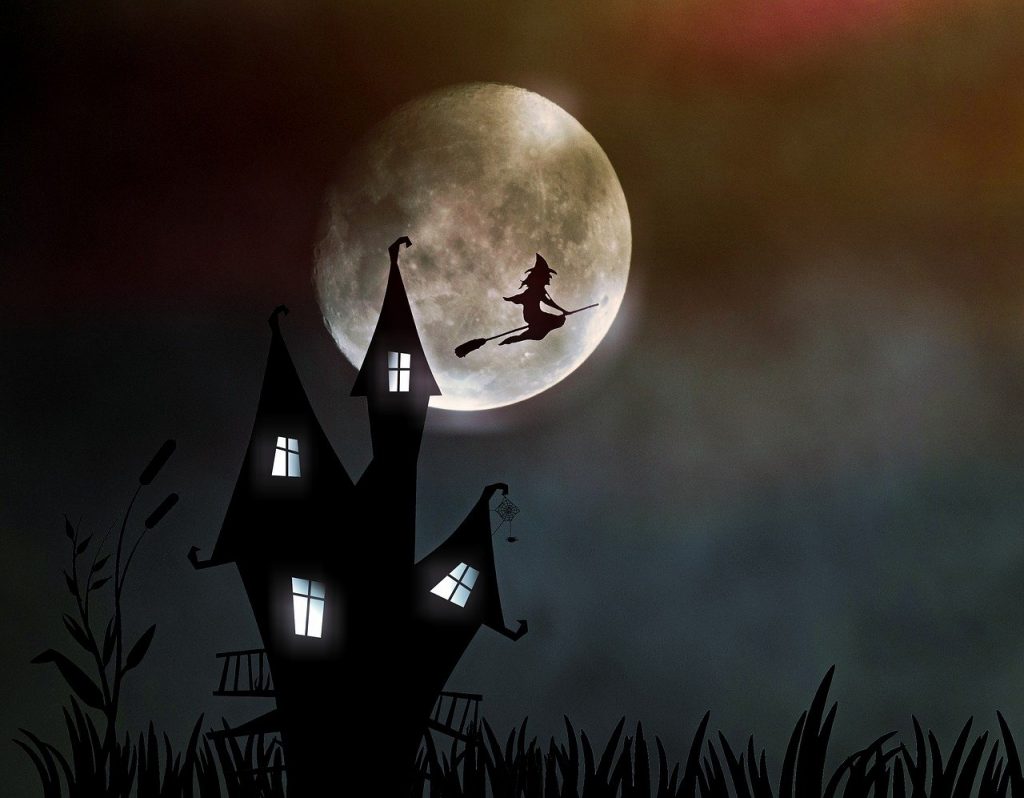 A witch on a broomstick, flying away from a big, crooked house during a full moon and fog. 